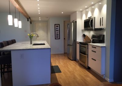 Port Moody Kitchen Remodel - oven side, low shot towards bathroom (1920x1440)